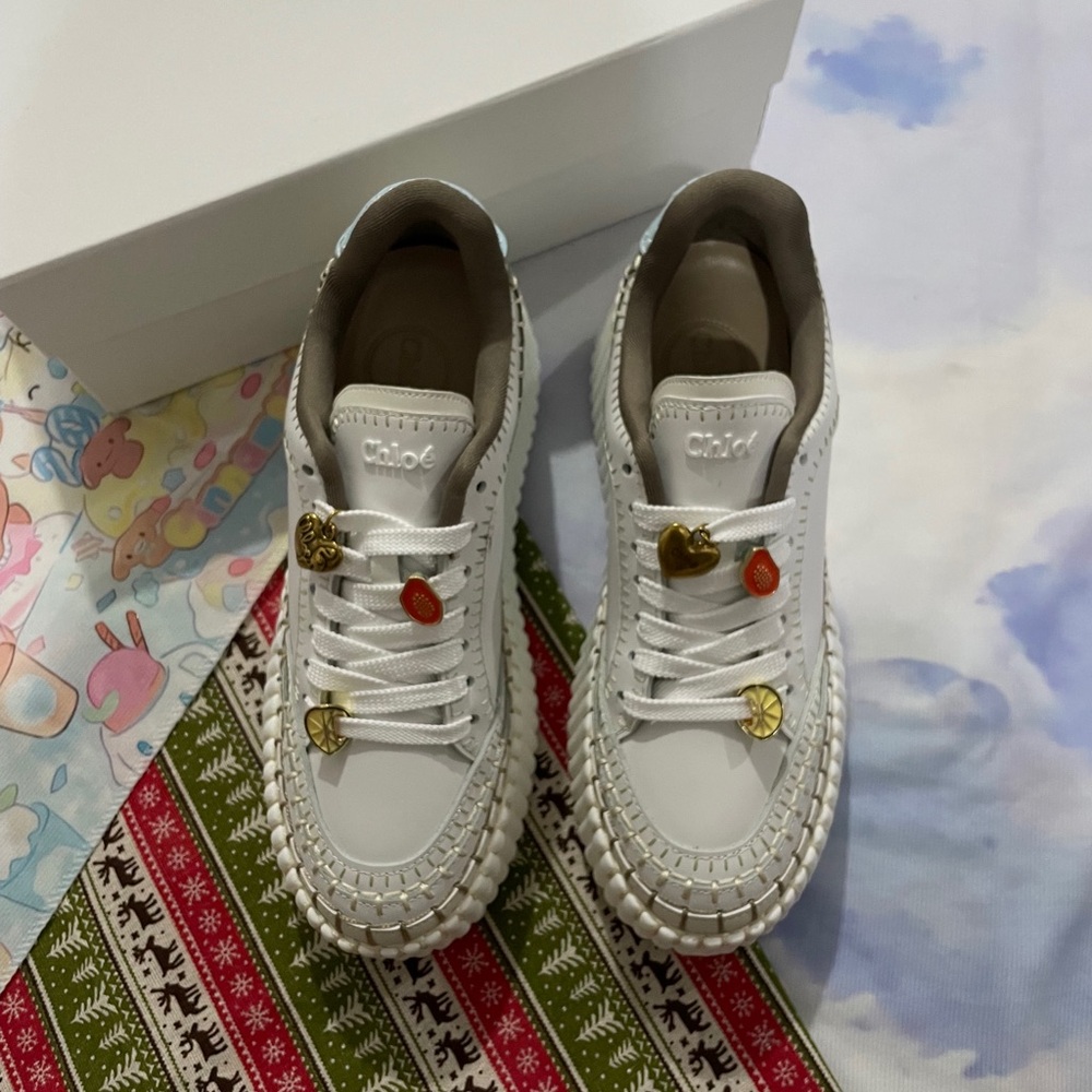 Chloé White Leather Sneakers with Gold and Orange Charms